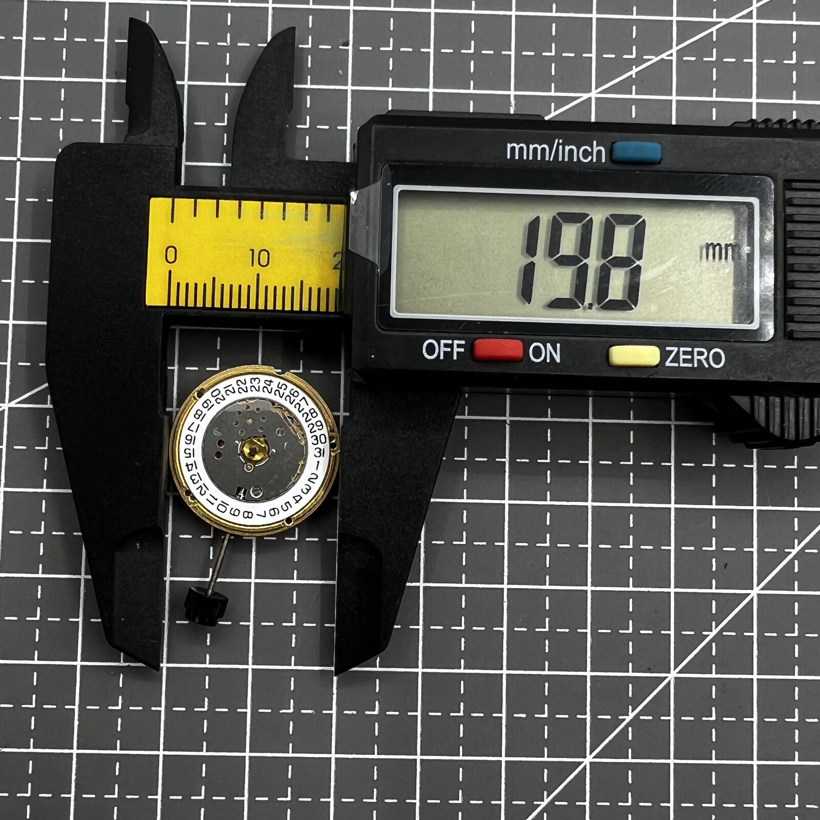 ETA F04.111 quartz watch movement showcasing three hands and date, Swiss precision craftsmanship.