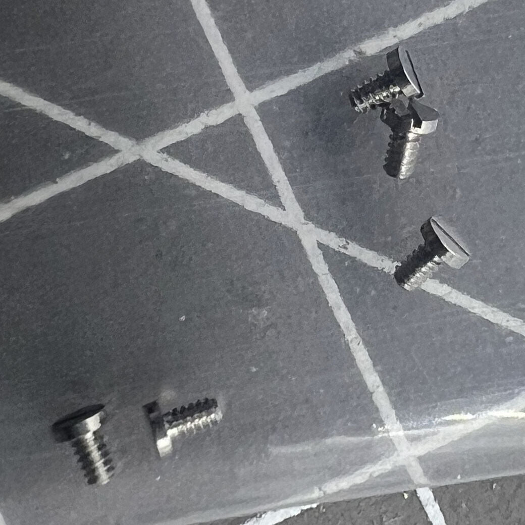 1. Replacements 3135-5110 watch case screws for RLX 3135 movement, durable clamp fittings by Replacements.  