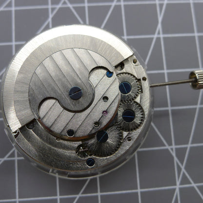Multifunctional automatic mechanical watch featuring kinetic energy tourbillon for accurate timekeeping.