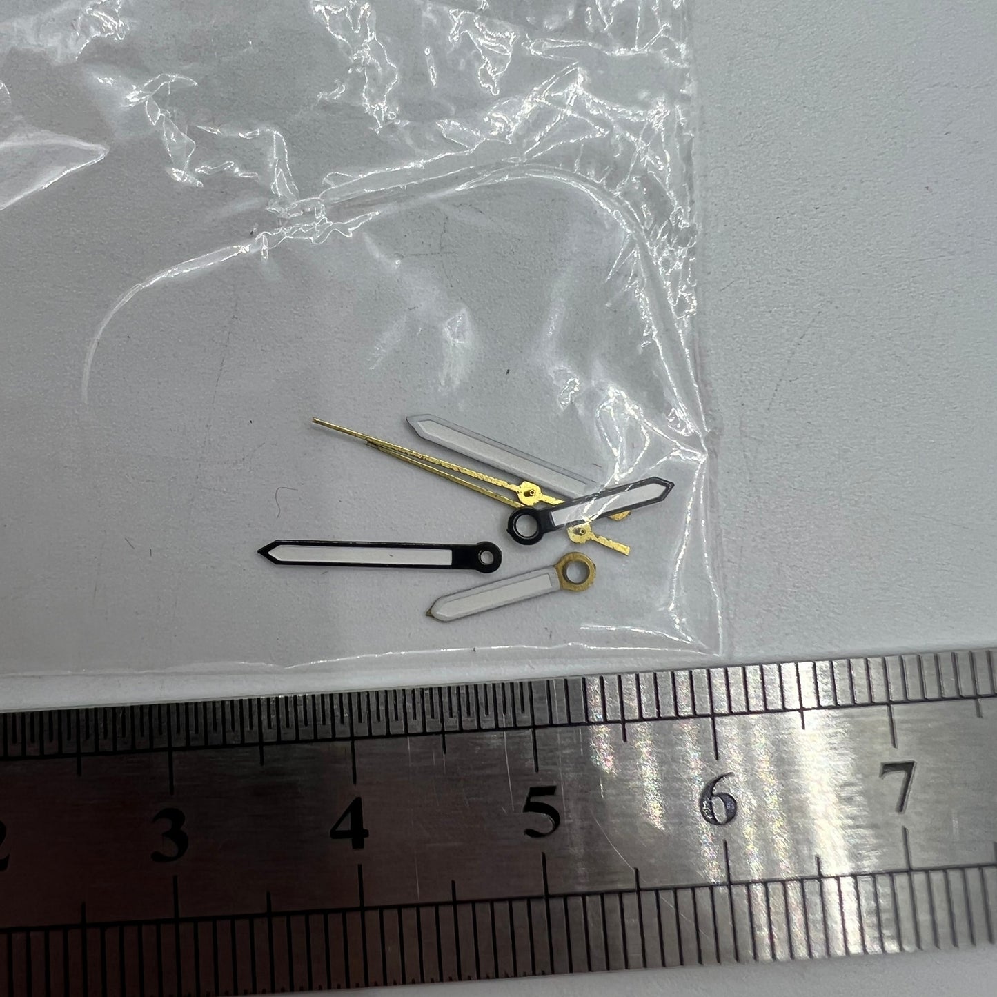 Luminous black watch hands for Miyota 2035 movement, boosting visibility and sleek style.