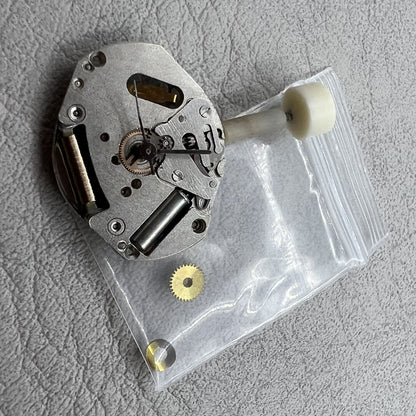 Poljot Z1656H quartz watch movement with three hands, vintage Russian watch accessory.