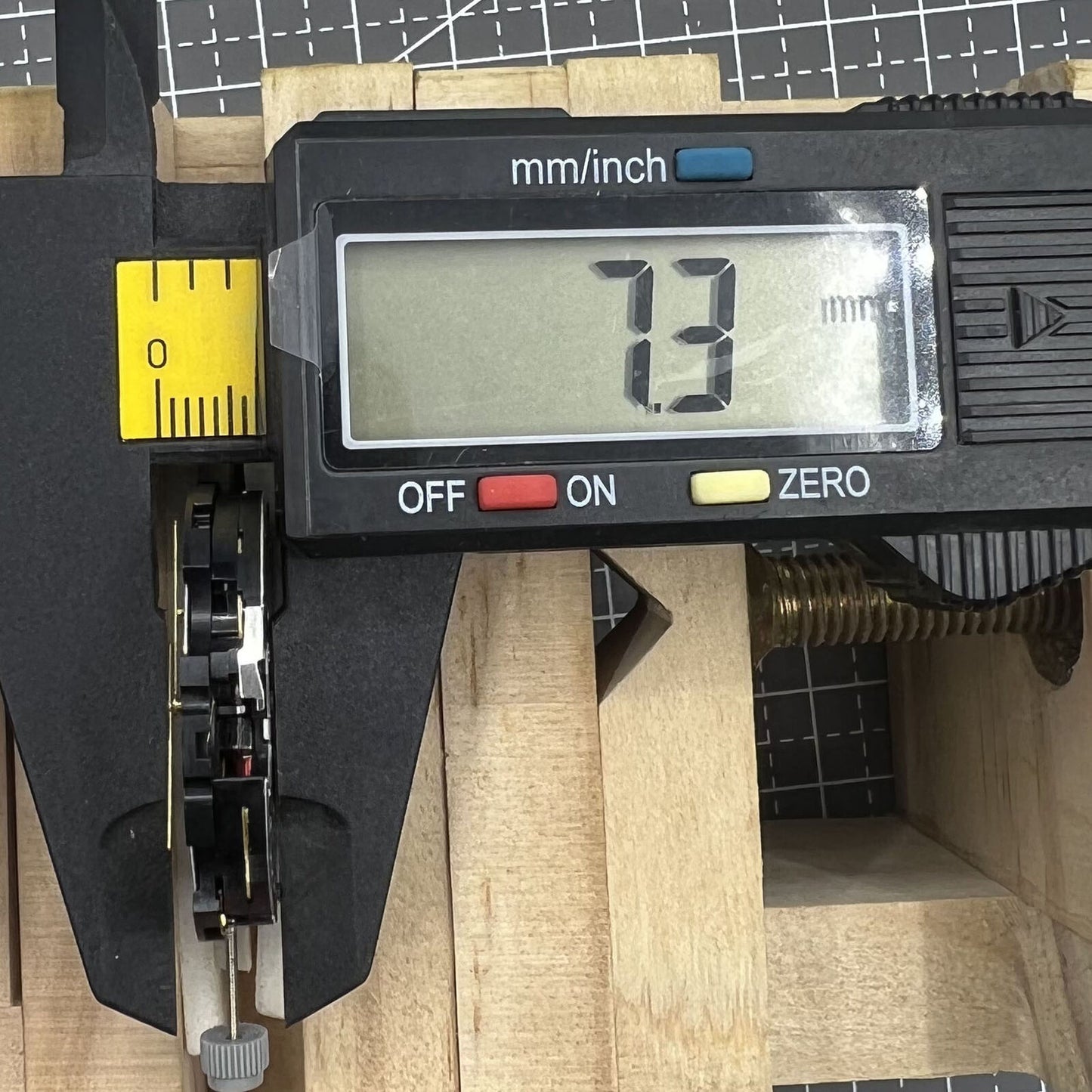 ETA G10.212 quartz watch movement with hour, minute, second hands, and date display by ETA.