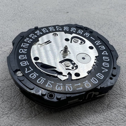 Seiko 7T12A quartz movement watch accessory with black single date display disc for precision timekeeping