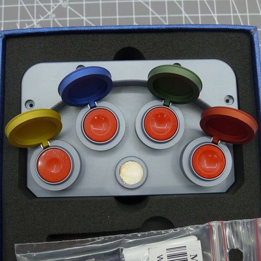 Die-cast alloy MSA17.000-04 oil cup stand with 4 containers for precise watch repair tool storage.