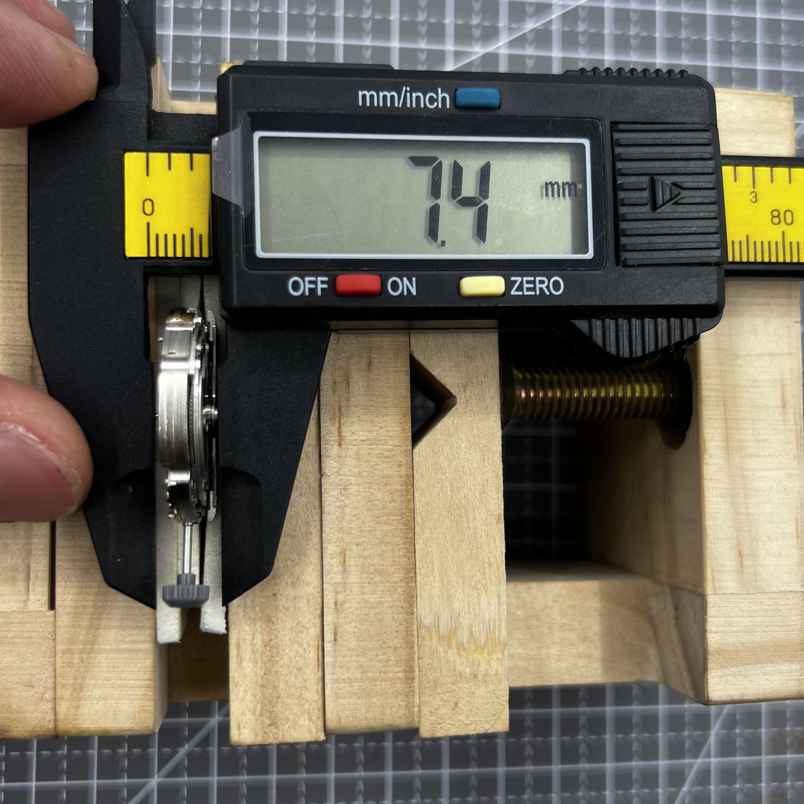 Miyota 8245 silver automatic watch movement showcasing precise Japan-made mechanical parts.