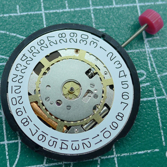 Swiss Made Ronda 715 quartz watch movement with date at 3, ideal for repairs and replacements.
