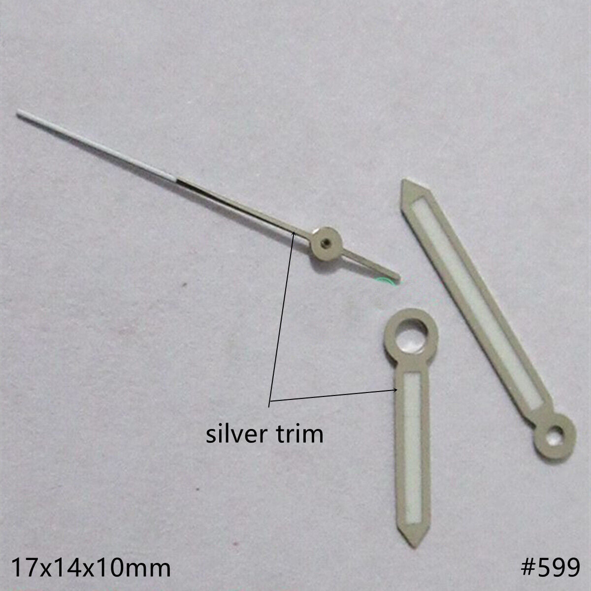 Silver trim green luminous watch hands set for Miyota 2035, enhancing visibility and style.
