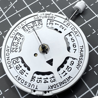 Swiss ISA 1198 quartz watch movement with day and date function for precise timekeeping.