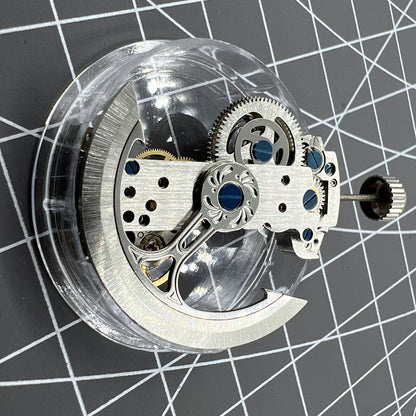 LG0807 silver rectangular balance wheel watch movement displaying intricate automatic mechanical design for precision timekeeping.