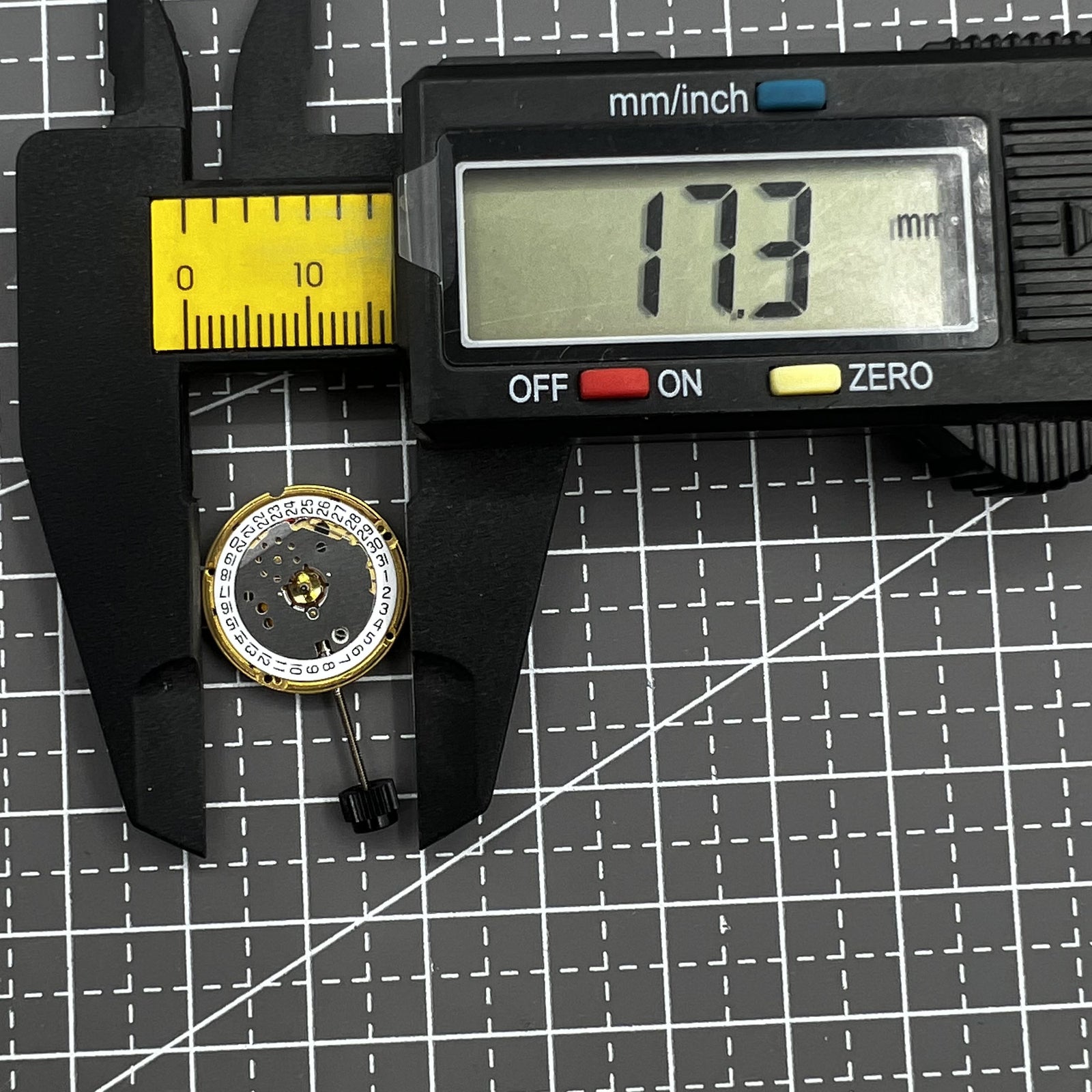ETA F03.115 quartz watch movement with three hands and date display at 3 o'clock, precision timing by ETA.