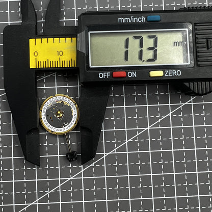 ETA F03.115 quartz watch movement with three hands and date display at 3 o'clock, precision timing by ETA.