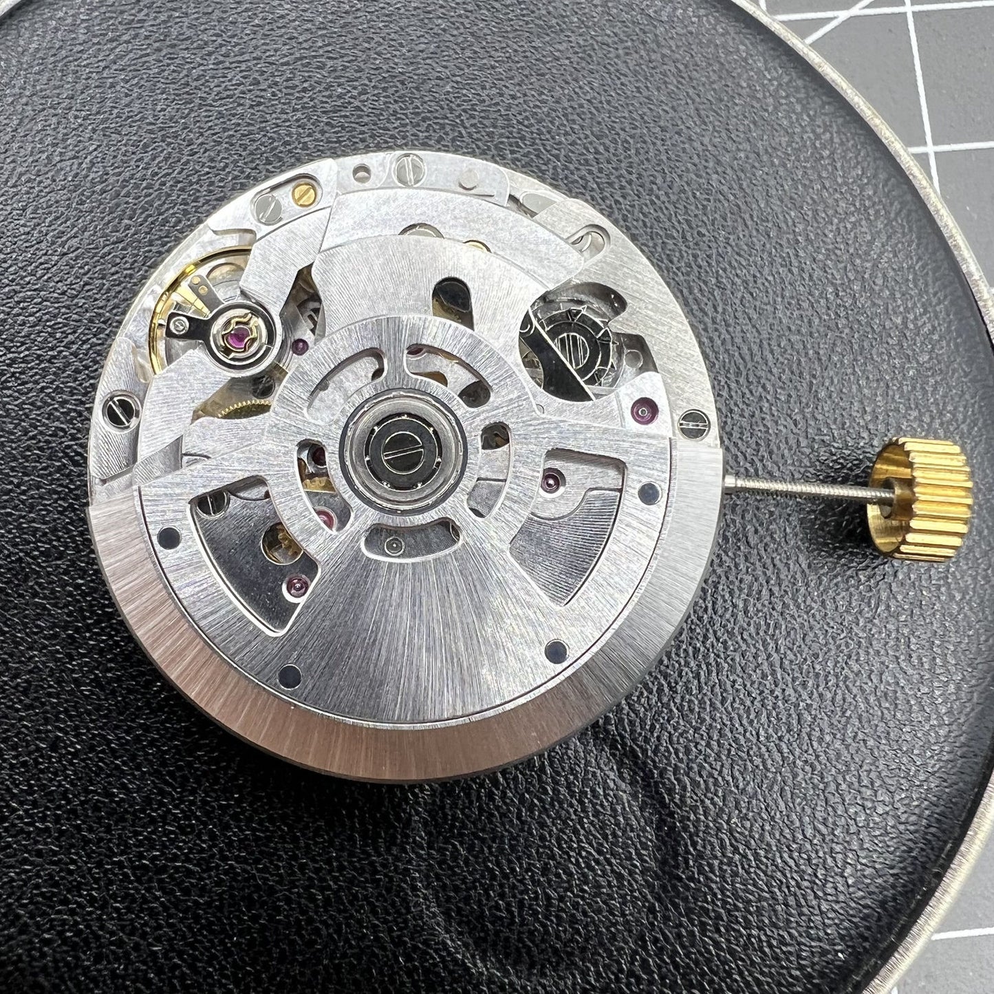 SL4801 automatic watch featuring multifunctional mechanical movement and small second subdials at 3, 6, and 9 o'clock.