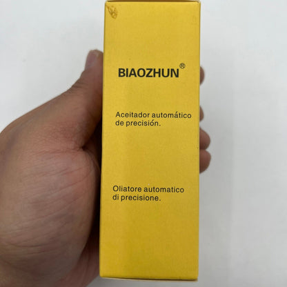 Automatic Precision Oiler tool by Watches Watchmakers 7718 applied for accurate watch gear lubrication and maintenance