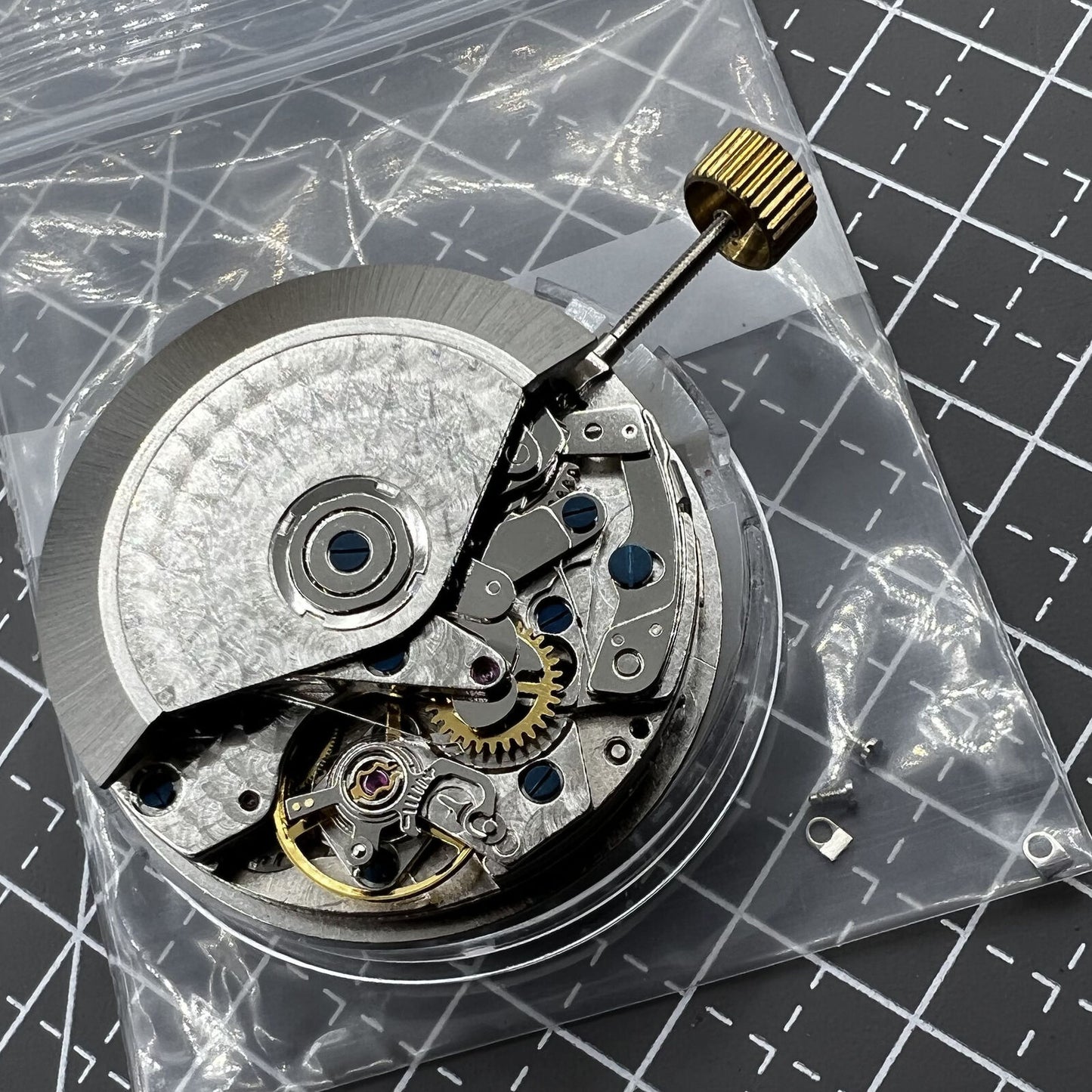 7750 Black dial chronograph watch with three hands, small seconds at 9 o'clock, day-date display,