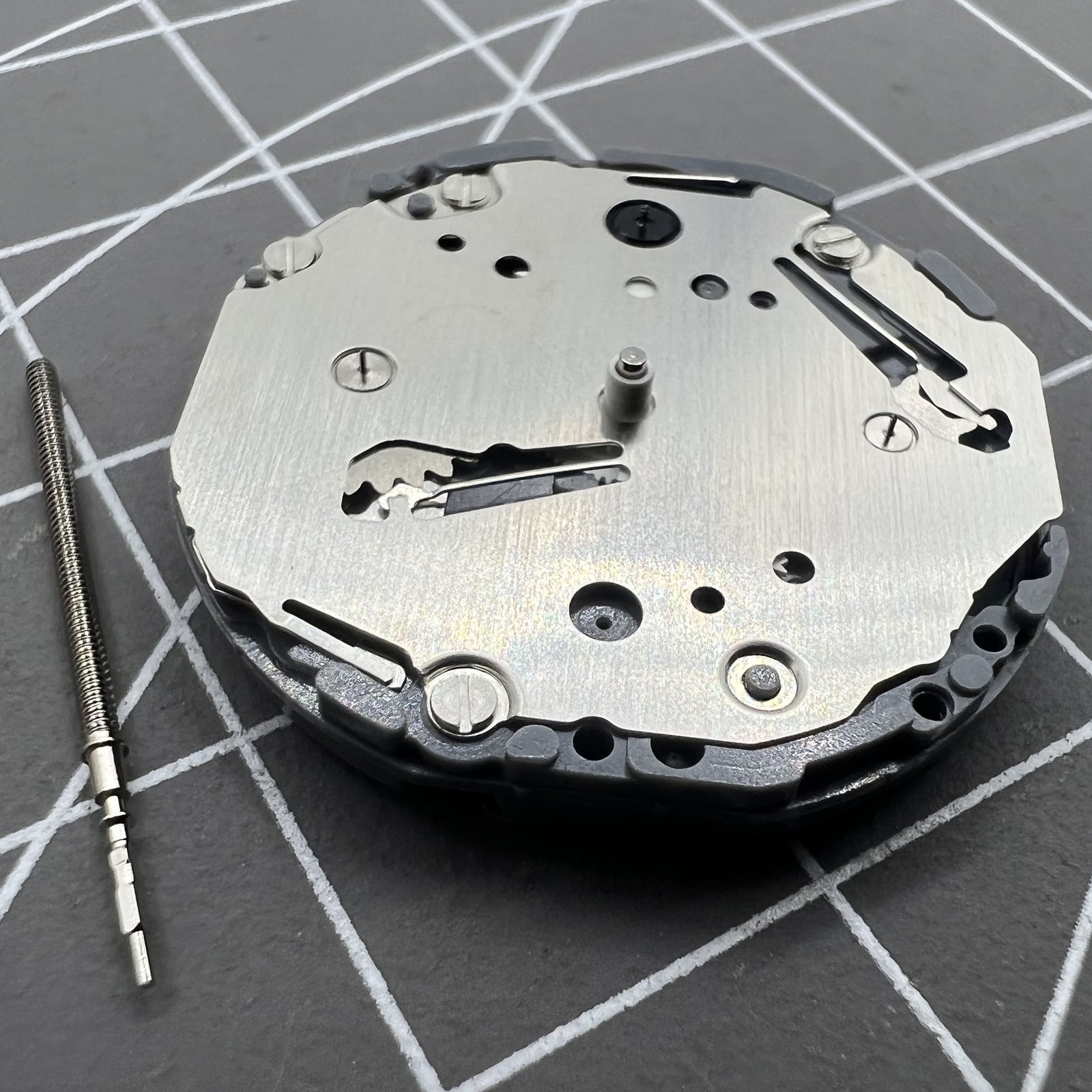 Hattori Epson TMI VD75 quartz watch movement, Japan-made, ideal for precise watch accessory repairs.