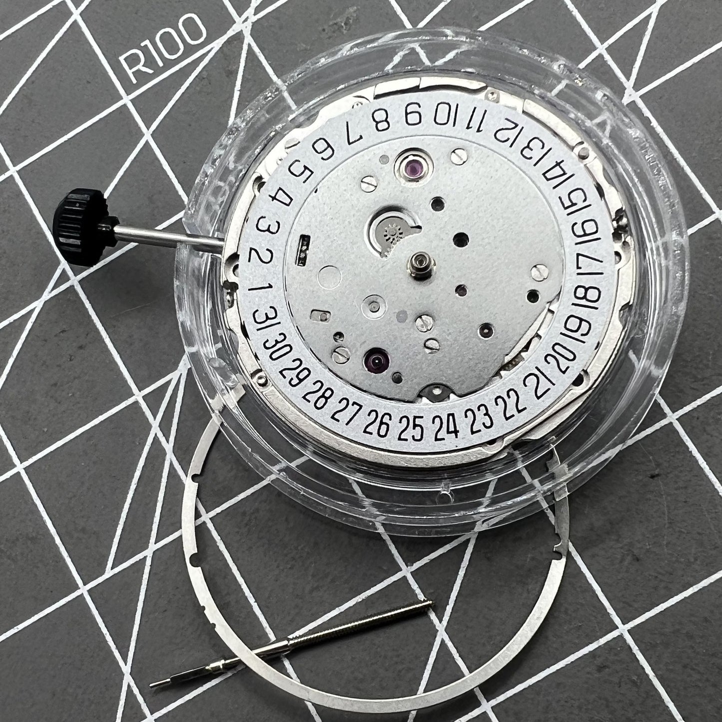 Miyota 9019 automatic watch movement with mechanical date display at 6 o'clock, precision Japanese brand.