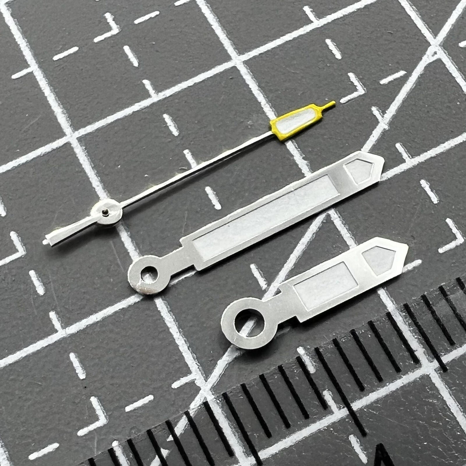 Silver and yellow pointed second hand watch hands for Seiko NH35 NH36, precision replacement parts.
