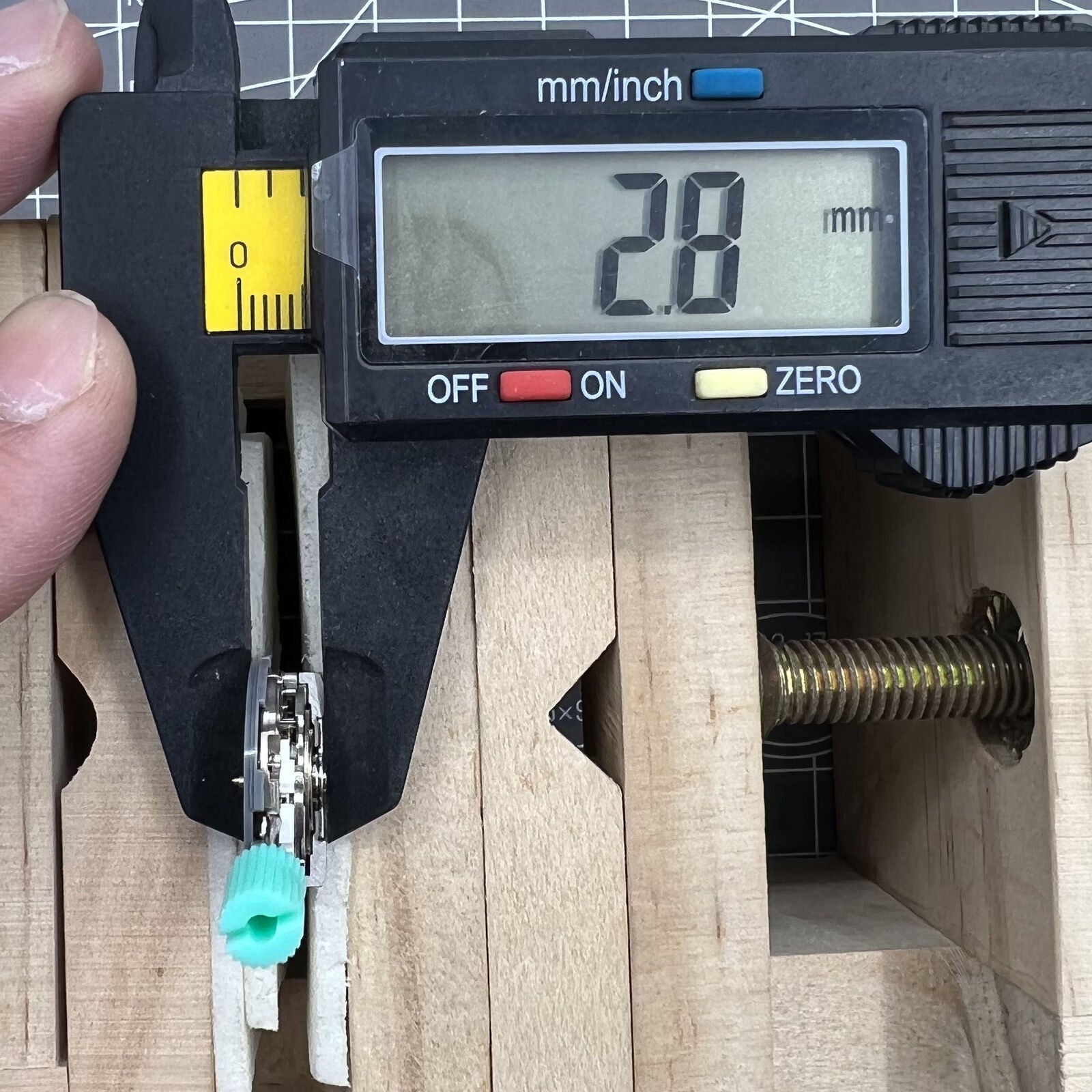 NH06A Japan-made watch movement displaying double calendar date window at 3 o'clock with precise timekeeping.