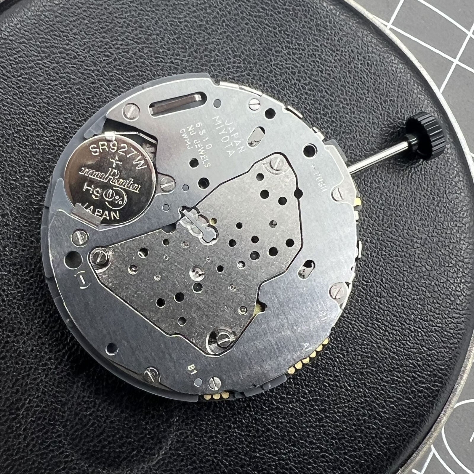 Miyota 6S10 quartz watch movement featuring small seconds at 6, 9, and 12 o'clock, date window at 3.