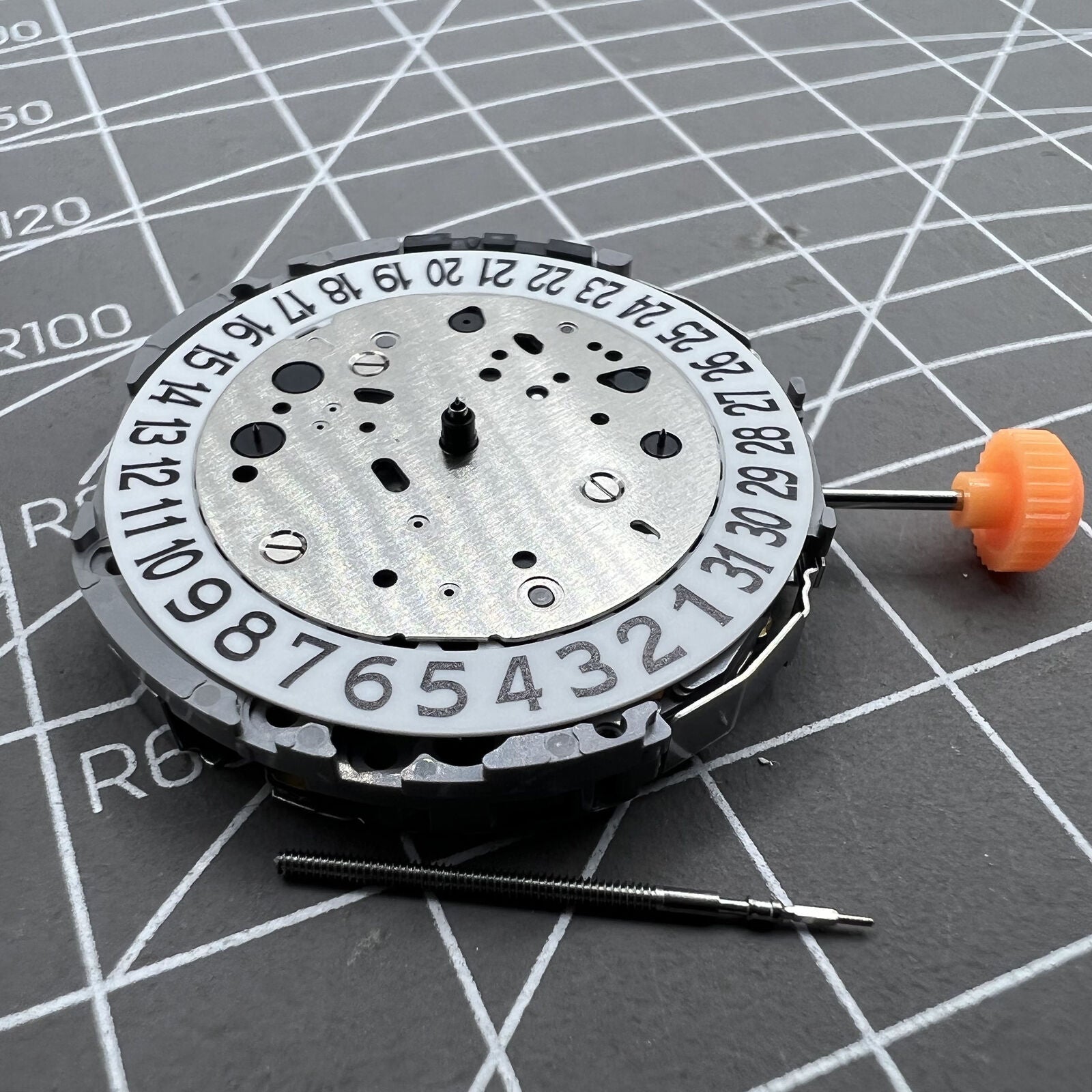 Miyota JP21 quartz movement with date display at 3 o'clock, reliable watch mechanism for accessories.