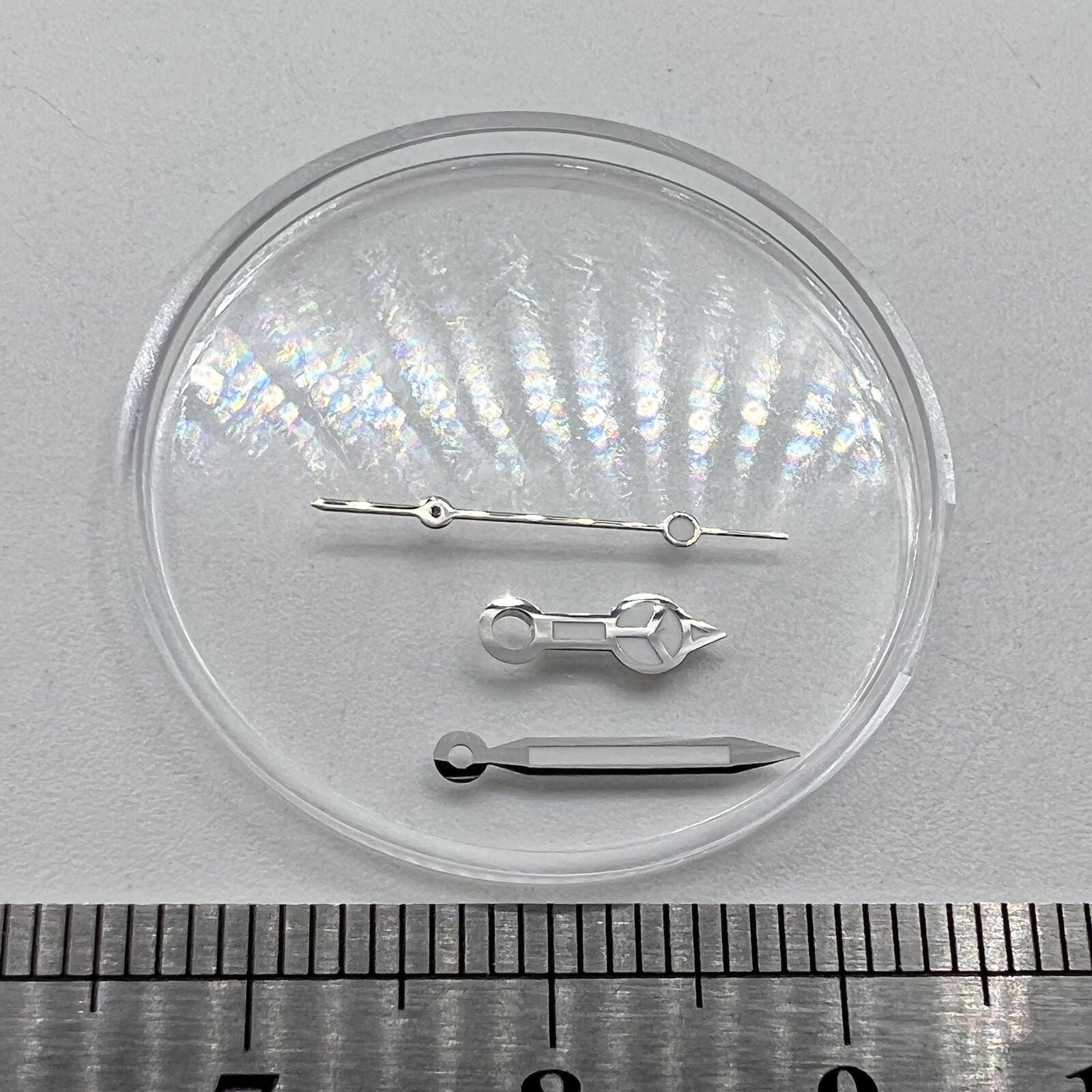 Green luminous 12mm watch hands with silver trim for Miyota NH35/NH36/NH38 movements.