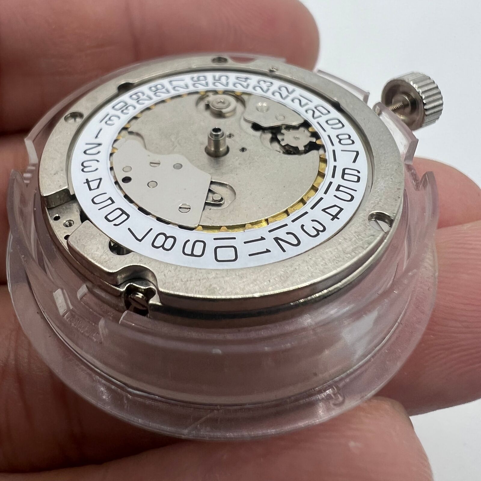 Seagull ST2551 automatic watch showcasing mechanical movement, silver dial with 3 hands and date at 3 o'clock.