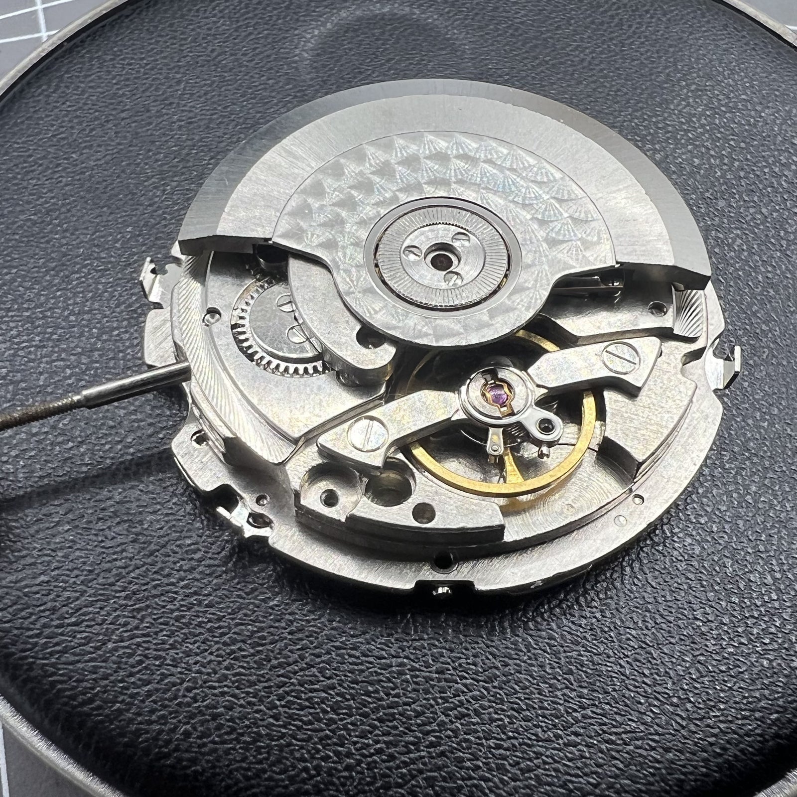 Tianjin Seagull ST25 automatic watch movement with large date and three hands, made in China.