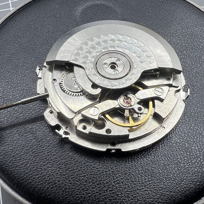 Tianjin Seagull ST25 automatic watch movement with large date and three hands, made in China.