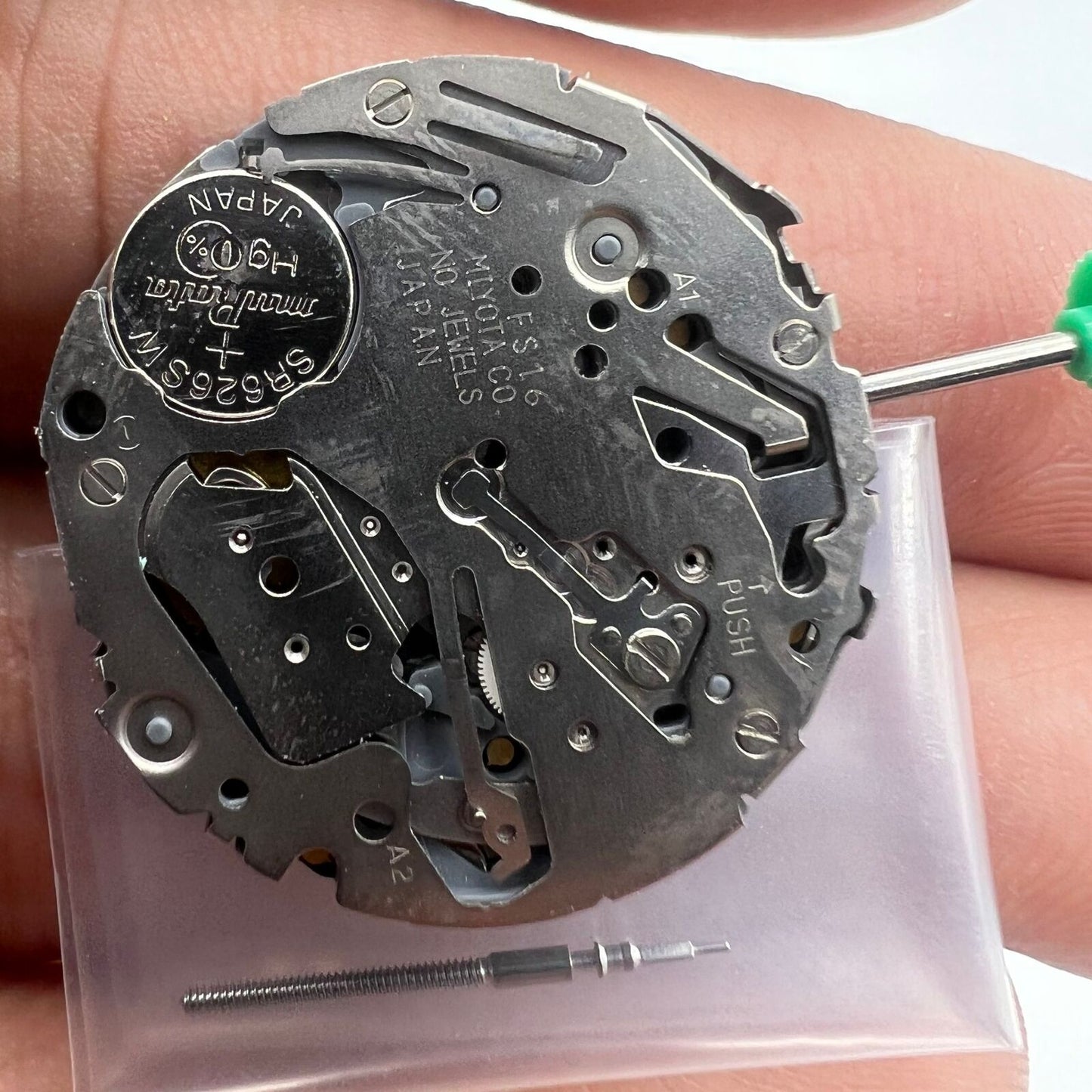 Miyota FS16 quartz watch movement with date display at 3 o'clock, precision Japan-made accessory.