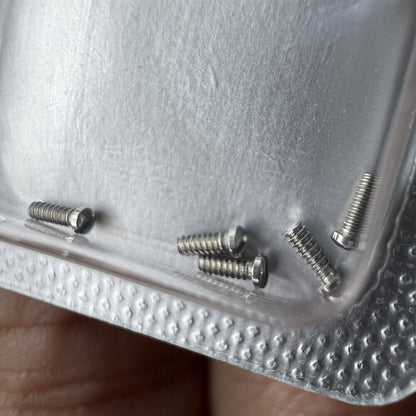 Men's 3x1mm slotted watch back cover screws for Cartier watches, durable watch repair accessory.