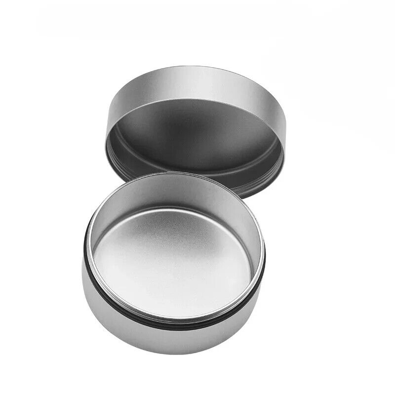 Steel and copper watch oil cylinder for precise watch repair and maintenance.