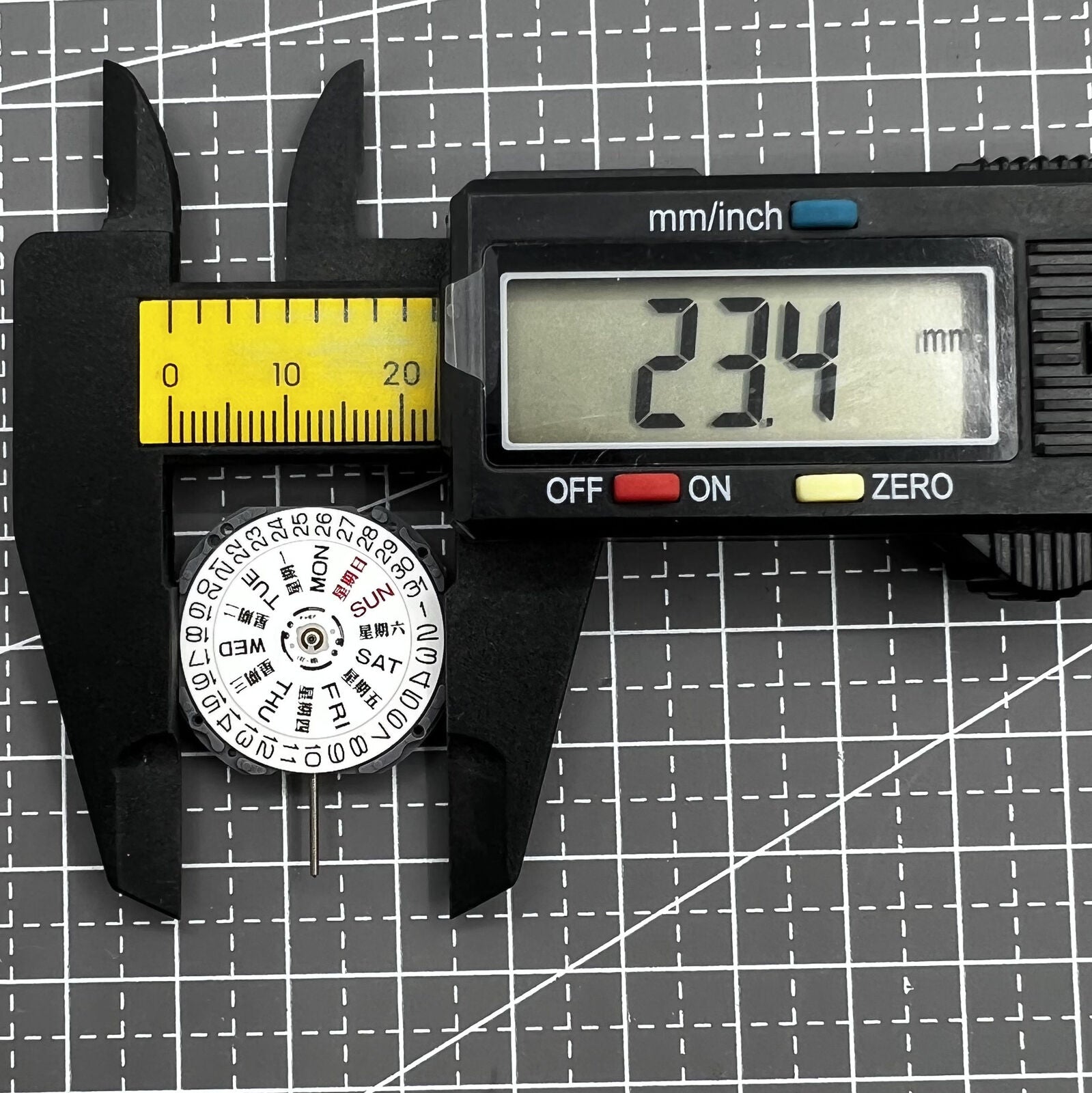 Hattori Epson VJ43 quartz watch movement showing day/date in English and Chinese for accurate timekeeping