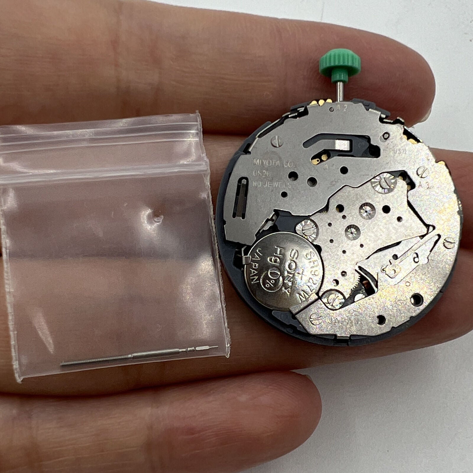 Japan Miyota OS20 quartz watch movement displaying date at 4:30, precise and reliable for watchmakers.