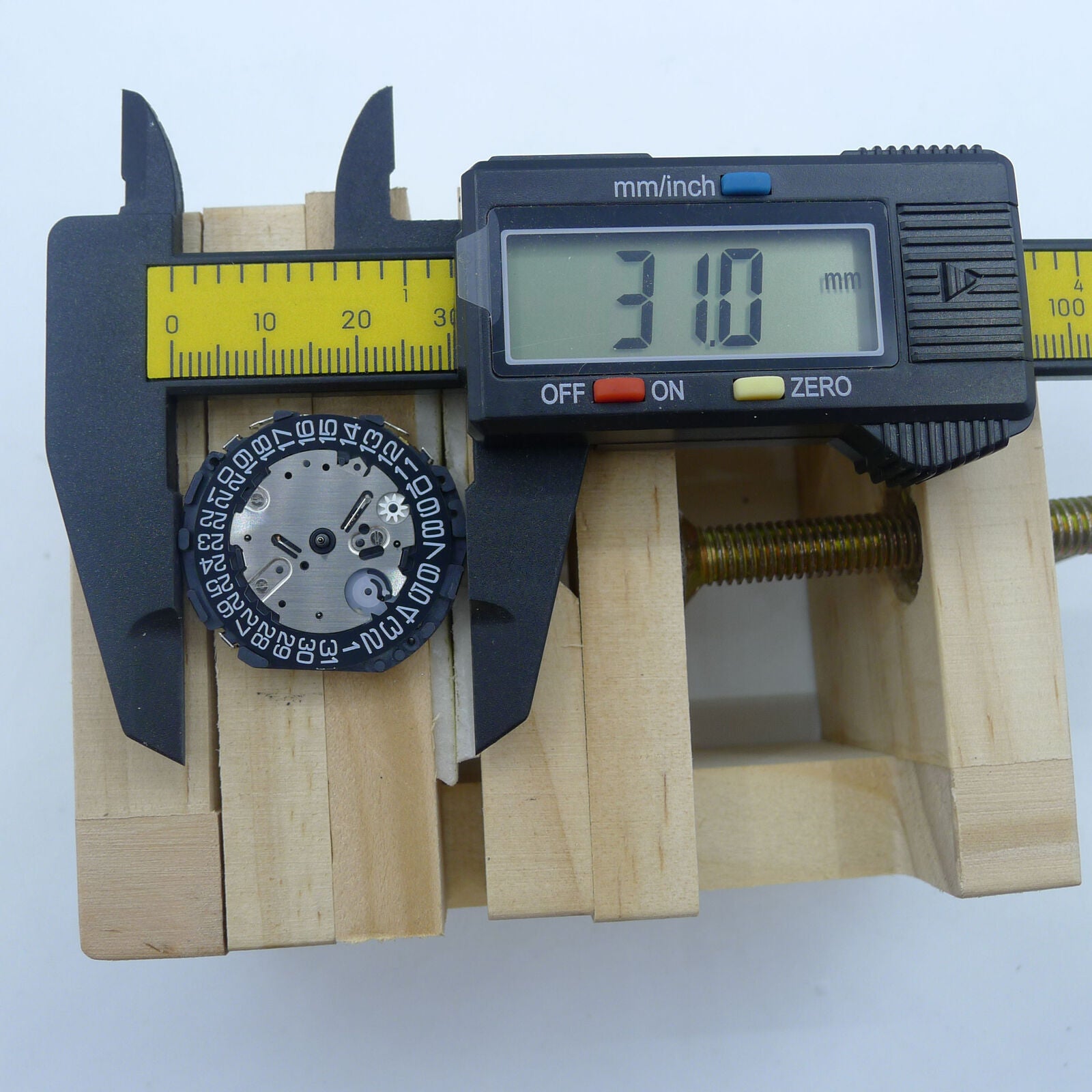 Japan Made VR32B quartz watch movement with multifunctional subdials and black dial.