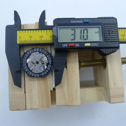 Japan Made VR32B quartz watch movement with multifunctional subdials and black dial.