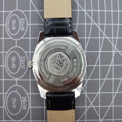 Shanghai Factory 38mm manual mechanical watch with white dial, 3 hands, 19 jewels, classic design by Shanghai Factory.