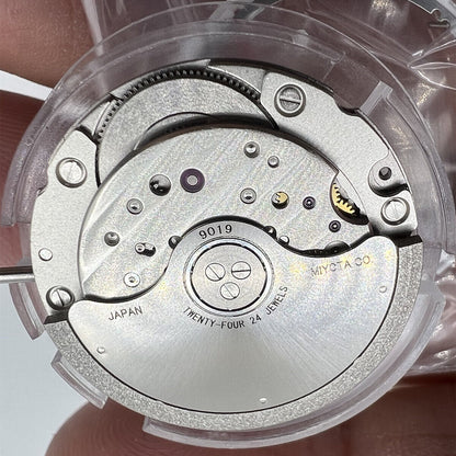Miyota Citizen 9019 automatic watch movement showcasing date displays at 3 and 6 o'clock positions.