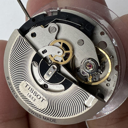 Swiss Made ETA C01.211 chronograph movement with white dial by 1853, showcasing precise mechanical craftsmanship.