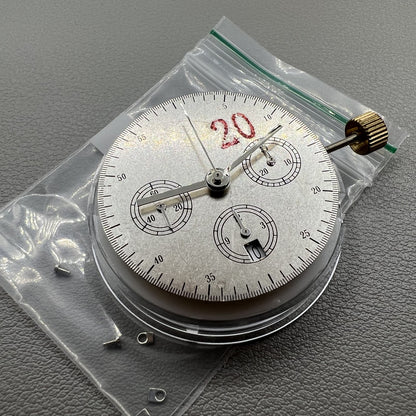 Chronograph watch accessory with ETA 7750 movement, white dial, calendar at 6, second hand at 9.