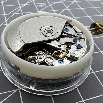 Asia Made 7750 black mechanical watch movement featuring single calendar and small seconds at 3, 6, and 9 o'clock positions, ideal for watch repairs.