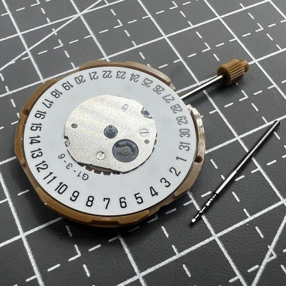 Japan Miyota GM10 watch movement with date display at 6 o'clock, precise quartz mechanism.