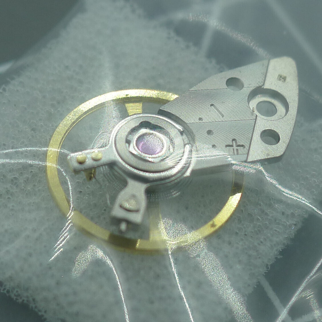 Silver complete balance wheel with splint for Miyota 82S7 watch movement, Japan-made precision part.