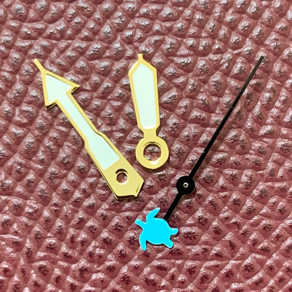 Green luminous watch hands set for NH35/NH36/4R36 Turtle/Fish movements, improving visibility in low light.