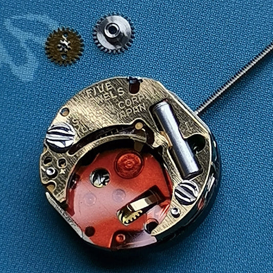 Epson YL50A quartz watch movement with 5 jewels and 2 hands, Japan-made for precise repairs.