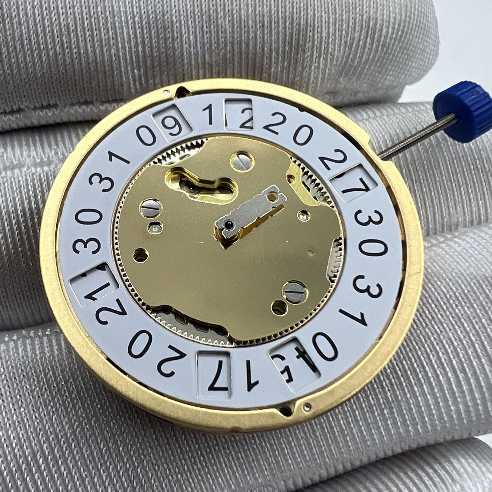 Swiss Ronda 4003B quartz watch movement with date feature at 12, precision Swiss made for accessories.