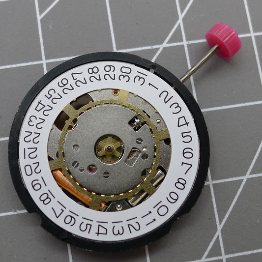 Swiss Made Ronda 715 quartz watch movement repair part showing date window at 3 o'clock.