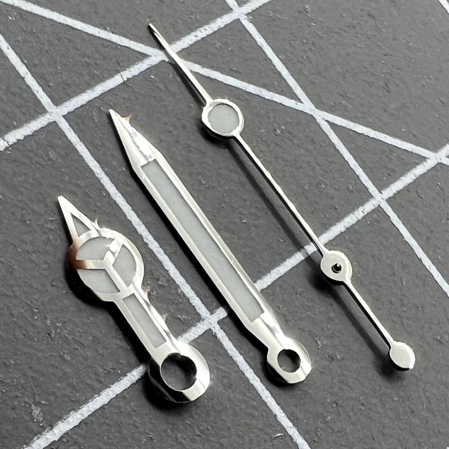 Luminous hour, minute, and second hands set for RLX 3135 watch movement by Luminous, perfect for repair.