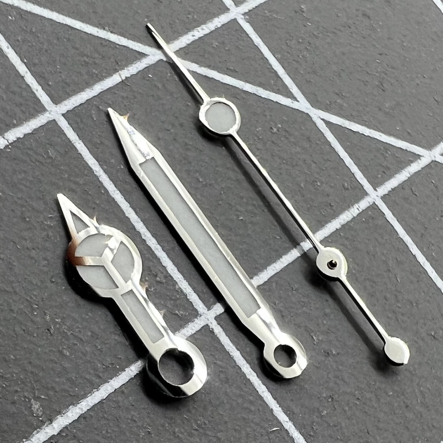 Luminous hour, minute, and second hands set for RLX 3135 watch movement by Luminous, perfect for repair.