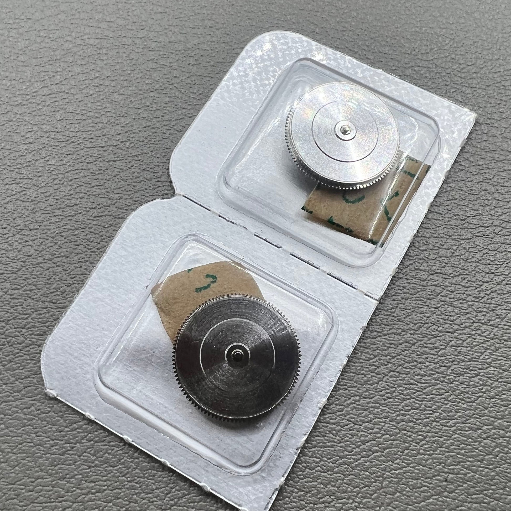 Complete barrel with mainspring for ETA 2892 watch movement, high precision replacement part.
