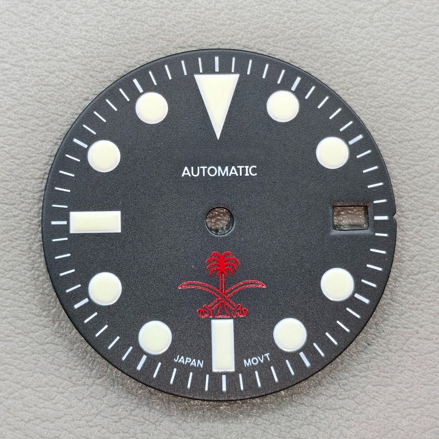 watch dial with S logo